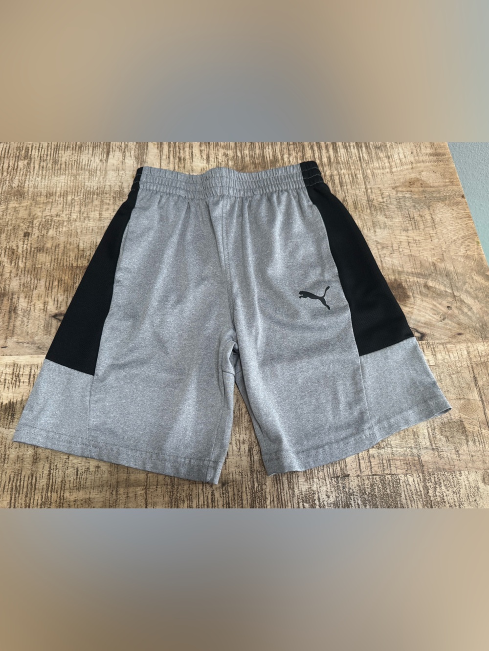 Puma Kids Grey Shorts with Black panels and side pockets. Great condition